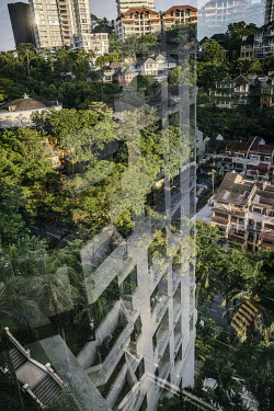 Views of residential buildings in Kuala Lumpur where residents are confined to their apartments by government order.  The Movement Control Order (MCO), a government ruling, forbids all public travel f...
