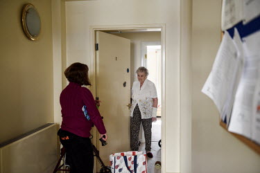 Audrey, an elderly Rothbury resident, receives a delivery of shopping from community volunteer Lesley Leeson. The town has a significant elderly population but its the community has rallied around to...