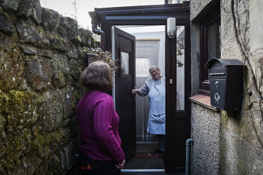 Volunteer Lesley Leeson delivers shopping to Barbara, an elderly resident of the town of Rothbury. The town has a significant elderly population but its the community has rallied around to ensure that...