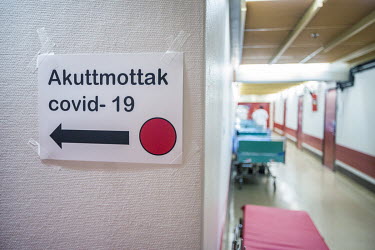 A temorary sign showing the way to the COVID-19 Emergency Room at the Drammen hospital.