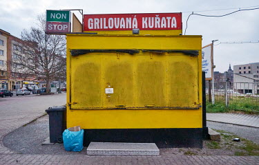 A sign at a 24 hour fast food street kiosk, near the Pilsen main train station, announces that it is temporarily closed.