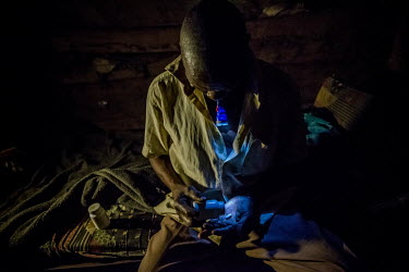 In his one-room house, Peter Lukyamuzi (50), HIV-positive for 15 years, takes his anti-retrovirals every day at 10 in the night. ''I used to be a boat pilot. I was going to distant islands. I had a wo...