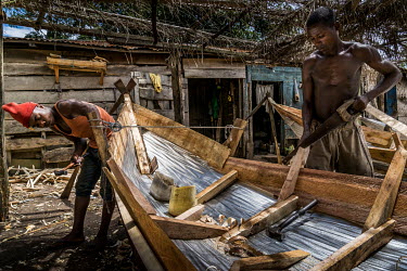 In the workshop of 'Mzee' (old man, in Swahili) Muga, workers make rowing boats, with corrugated iron hulls and wooden frames. The boat's lifespan is estimated at just one year. Throughout the Kagera...