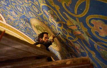 An artist painting the ceiling during the restoriation of the Pilsne Great Synagogue. The Great Synagogue was built in Moorish-Romanesque style in 1893. It is the third largest synagogue in Europe and...