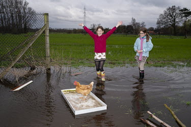Twins Billie and Suzanne launch Alexandra the chicken on her voyage across the garden pond.  When Belgium followed much of the rest of the world into lockdown, Nick Hannes, like many Panos photographe...