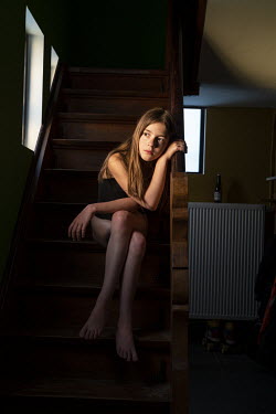 Suzanne on the stairs.  When Belgium followed much of the rest of the world into lockdown, Nick Hannes, like many Panos photographers, found himself unable to venture far from his home. In response, h...
