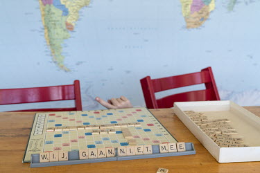 Billie and Suzanne play Scrabble and make the sentence 'We're not going with you'. My daughters enjoy staying at home. The virus offers them the ideal excuse not to have to leave the house if they don...