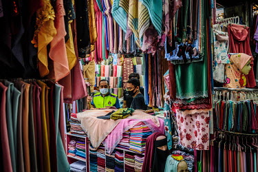 A normally busy shopping area in and around Jalan Masjid India is relatively subdued despite the slight relaxation of lockdown rules during the Eid Muslim festivities. Details and temperature checks a...