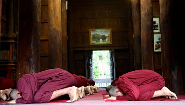 Novice monks praying at the Shwe Nan Daw Kyaung monastery.