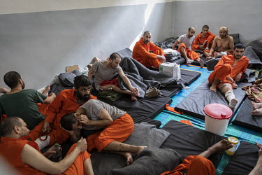 Suspected ISIS members, many of them badly injured from the final months of battle earlier in 2019, languish inside a large crowded cell at a prison controlled by Kurdish forces in northeast Syria.