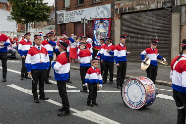 Young boys from a Protestant marching band gather before a march through the city on the 12th of July to commemorate the Protestant victory over James II Catholic forces at the 'Battle of the Boyne' i...