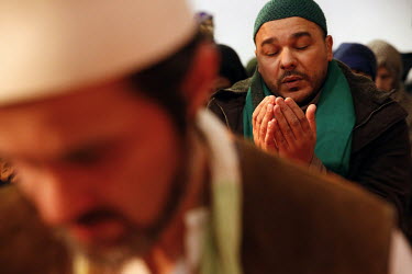 Naqshbandi sufis praying in La Maison Soufie.