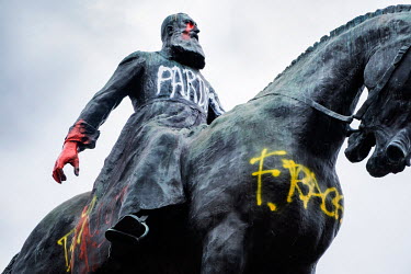 A statue of King Leopold II (1835 - 1909), King of the Belgians, that has been defaced in the wake of worldwide protests in support of Black Lives Matter following the death in custody of George Floyd...