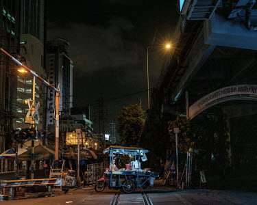A street vendor and his food stall wait for any custom as the coronavirus lockdown curfew, which runs from 2200 until 0300hrs (as of 25/05/2020), approaches.