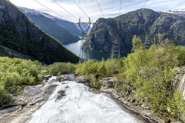 Water and power lines from a Hydroelectric power plant in the mountains surrounding Aurland.