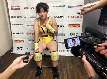 Yurika Oka (16), a rising star of women's wrestling and member of the popular Sendai Girls, promotion, is interviewed after a bout at a women's wrestling competition held at the Shin-Kiba 1st Ring in...