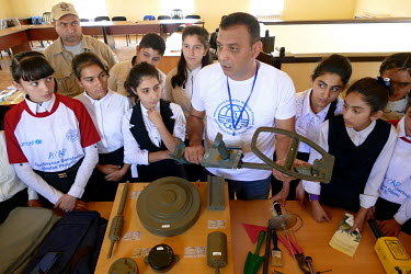 Children take part in a landmine awareness class, part of the Azerbaijan Youth Advocates Program (YAP), at the Terter Vocational Training Centre.