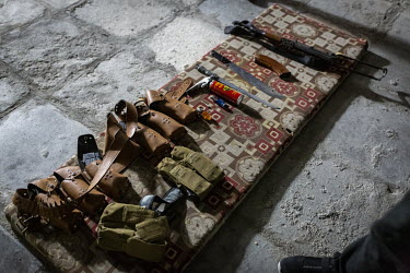 Weapons and multiple magazines of ammunition were found at the home of a known drug dealer during a night time raid by narcotics police at a house on the outskirts of Basra.