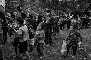 Meals and hygiene products are distributed by members of an evangelical church to the residents of a squatter camp in the northern part of Sao Paulo. With the economic crisis caused by the coronavirus...