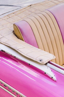 A detail of a restored 1959 Chevrolet Impala used as a tourist taxi.   Since the Cuban government put a heavy focus on tourism to drive GDP, taxi drivers (in both classic cars and regular vehicles) ha...