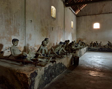 A reconstruction of a cell in the Phu Hai prison, built in 1862 during the French colonial-era. The room could contain 120 prisoners chained to a metal bar by their ankle.
