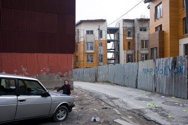 A child plays in the street in Sulukule in the Fatih district. Sulukule, a historic Roma district, has been razed after it was declared an 'Urban Transformation Zone' by the municipality and new luxur...