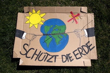 'Schuetzt die Erde', one of the thousands of protest signs and banners laid out by environmental activists, part of 'FridaysForFuture', 'Fridays for Future', or 'Global Strike for Future' climate prot...