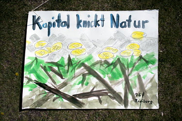 'Kapital Knickt Natur', one of the thousands of protest signs and banners laid out by environmental activists, part of 'FridaysForFuture', 'Fridays for Future', or 'Global Strike for Future' climate p...
