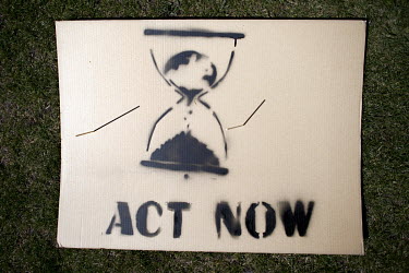'Act Now', one of the thousands of protest signs and banners laid out by environmental activists, part of 'FridaysForFuture', 'Fridays for Future', or 'Global Strike for Future' climate protest, in fr...