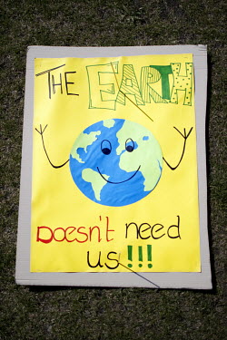 'The Earth Doesn't Need Us', one of the thousands of protest signs and banners laid out by environmental activists, part of 'FridaysForFuture', 'Fridays for Future', or 'Global Strike for Future' clim...