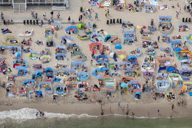 Large crowds on a public beach in Wladyslawowo, a small tourist town on the Baltic Sea, on the sunny first weekend of August. This is usually one of the most crowded beaches in Poland and 2020 has bee...