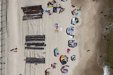 An aerial view of the public beach in Wladyslawowo, a small tourist town on the Baltic Sea, on the sunny first weekend of August. This is usually one of the most crowded beaches in Poland and 2020 has...
