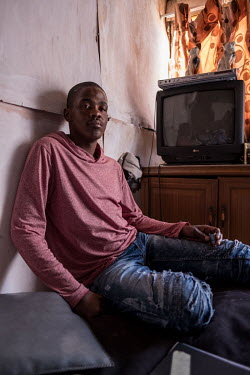 A 'tik' (crystal methamphetamine) dealer relaxes at a friend's house during the coronavirus lockdown. He said business had been booming since the government introduced a ban on cigarettes and alcohol...