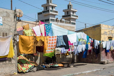 Laundry hangs outside a house in the Guet Ndar district, a neighbourhood that lives off fishing but is threatened by the sea's constant erosion of the coast.