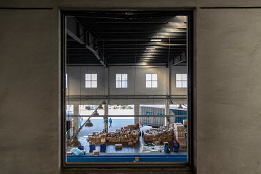 A view of a unloading area at a ZTO Express Inc. sorting facility. Package delivery billionaires, including the founder of ZTO Express, have seen their fortunes swell as online shopping has grown in r...
