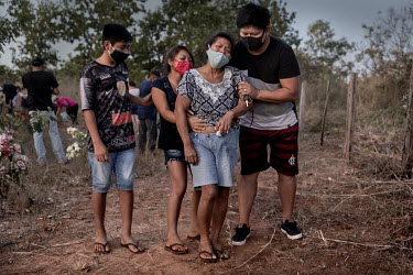 Villagers and family, including his wife Zenira Pereira Francisco (2nd right) and their children Sandro (13), Luciana (16) and Wesley (23), from the indigenous Terena community living in the village o...