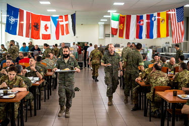 NATO ground forces from various countries gather to eat in a canteen at the Adazi military base from where a joint exercise is being operated.