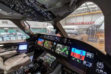 A mock-up of a Commercial Aircraft Corp. of China Ltd. (Comac) C919 aircraft cockpit on displayd at the Comac Shanghai Research and Development Center.