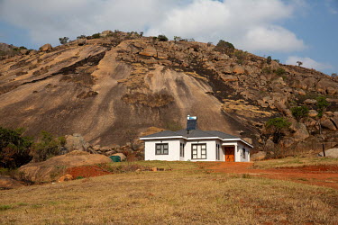 A newly built house sits at the base of the Sibebe Rock on the outskirts of the capital city Mbabane. Sibebe Rock is the 2nd largest granite rock in the world.