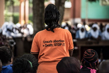 Milly Namulindwa, a teacher and Volunteers Developmnent Association of Uganda (VODA) community volunteer, talks to students from the Kasana Vocational Secondary School about safe abortions and reprodu...