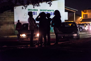Sex workers waiting for clients on a roadside in the mining town of Selebi Phikwe.