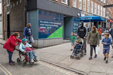 Pedestrian pass a closed down business which has had advertising placed in its windows offering the site for rental. It is one of many retail shops in Hampstead and beyond that has closed down as the...