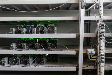 Bitcoin mining computers at a warehouse mining facility operated by Bitmain Technologies Ltd. Bitmain is one of the leading producers of Bitcoin-mining equipment and also runs Antpool, a processing po...