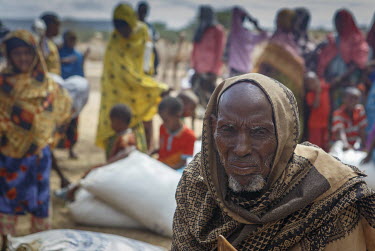 An elderly man waits at a food distribution point for internally displaced people and drought victims in the Somali region.
