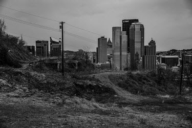 Downtown Pittsburgh. The wider population of the city has halved since its 1960s high point. Like many of the so-called rust belt states, Pennsylvania's heavy industries have declined due to globalisa...