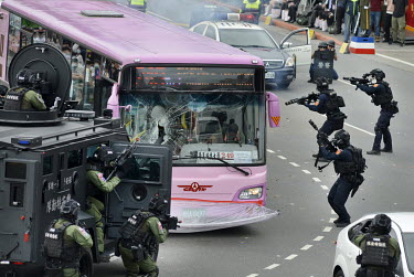 A police SWAT team stage a mock terrorist situation during official celebrations marking the 109th Taiwan (The Republic of China) National Day on 10 October 2020.