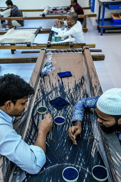 Labourers attach beads and sequins to fabrics in a factory in Lower Parel that is part of Maximiliano Modesti's Les Ateliers 2M, a Mumbai embroidery firm that works with many luxury western brands. Un...