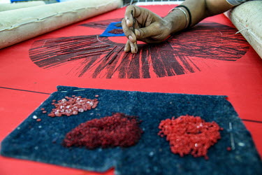 Labourers attach beads and sequins to fabrics in a factory in Lower Parel that is part of Maximiliano Modesti's Les Ateliers 2M, a Mumbai embroidery firm that works with many luxury western brands. Un...