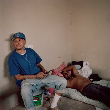 Andres (not his real name), a central American migrant, rests at a safe house. Andres was deported from the USA after living there for several years, but is determined to cross back again, as he says...