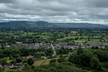 The village of Llanymynech viewed from Llanymynech Hill. The left side of the village is in England, the right side is in Wales. The border runs down the middle of the main road that splits the villag...